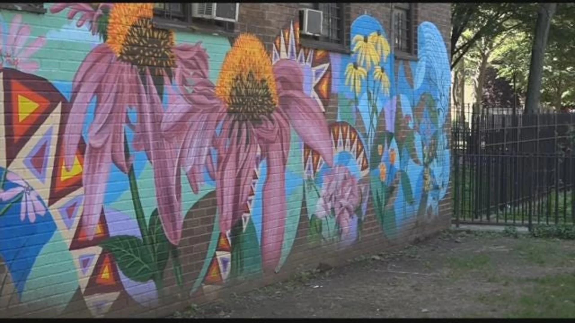 Flower mural unveiled at Tompkins Houses in Bed-Stuy