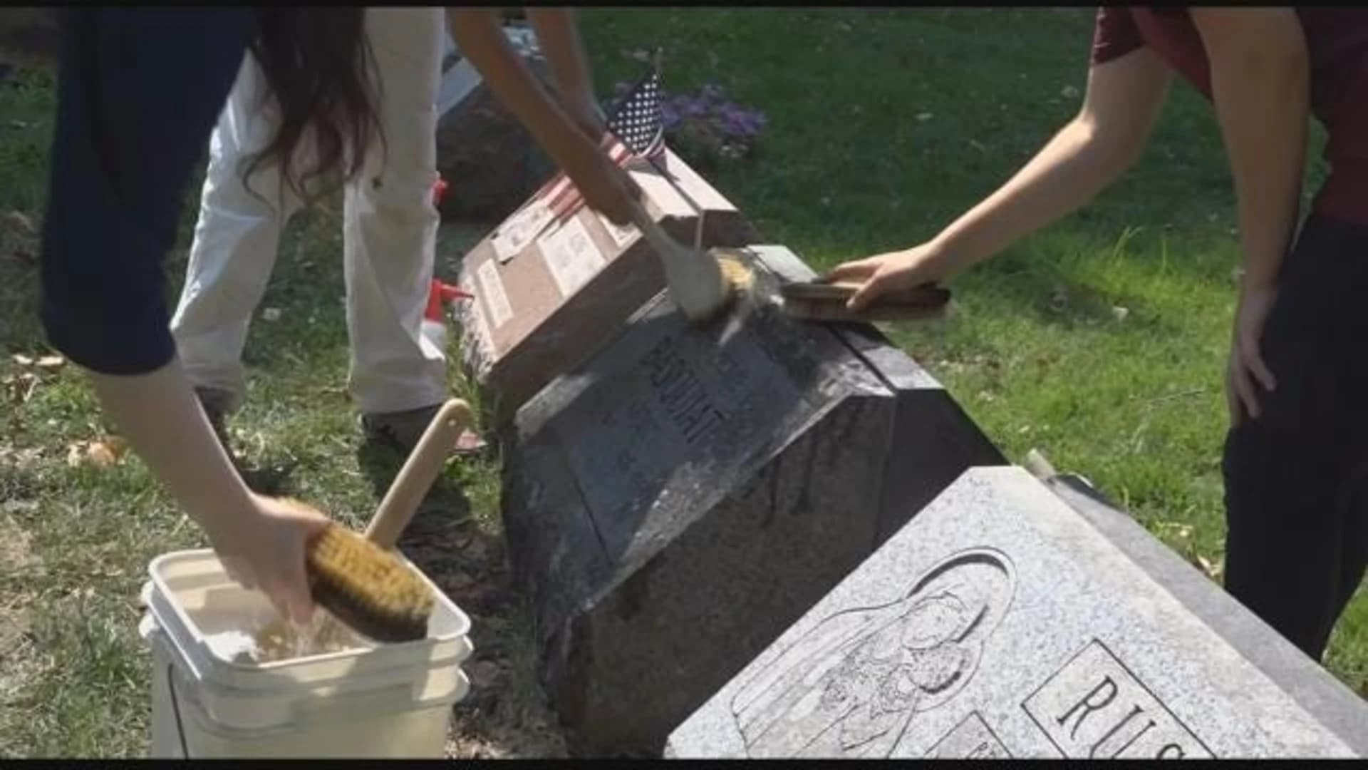 French volunteers restore Basquiat memorial at Green-Wood