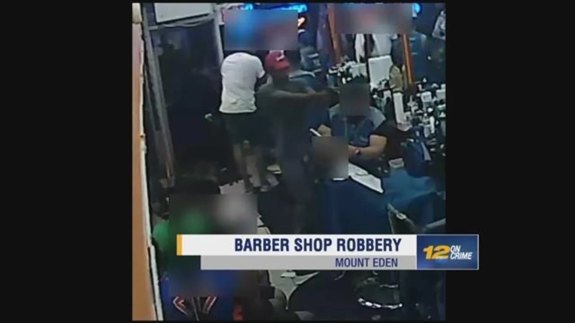 Police search for 2 barbershop robbery suspects in Mount Eden