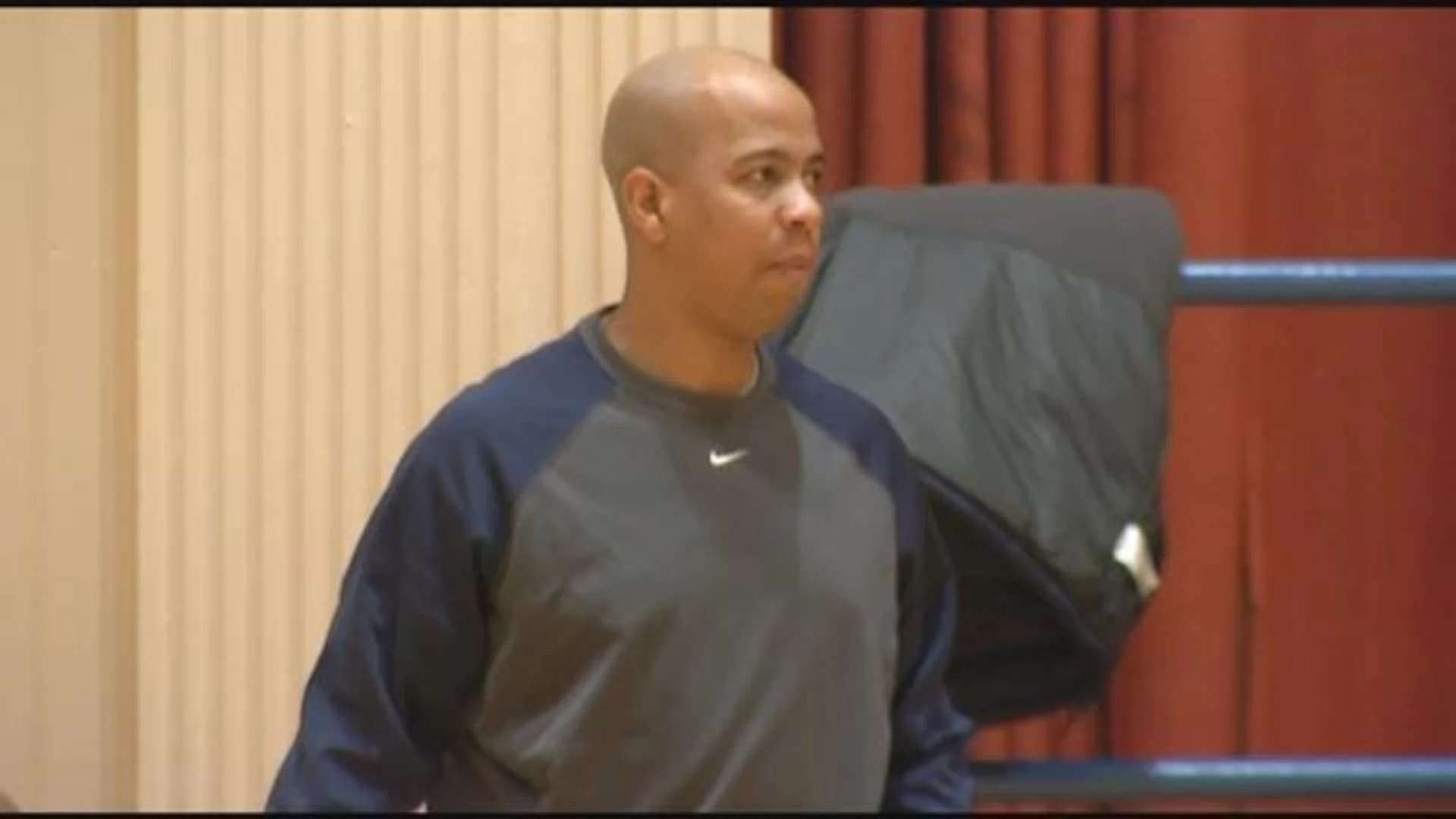 High school basketball coach charged with shooting player's parent
