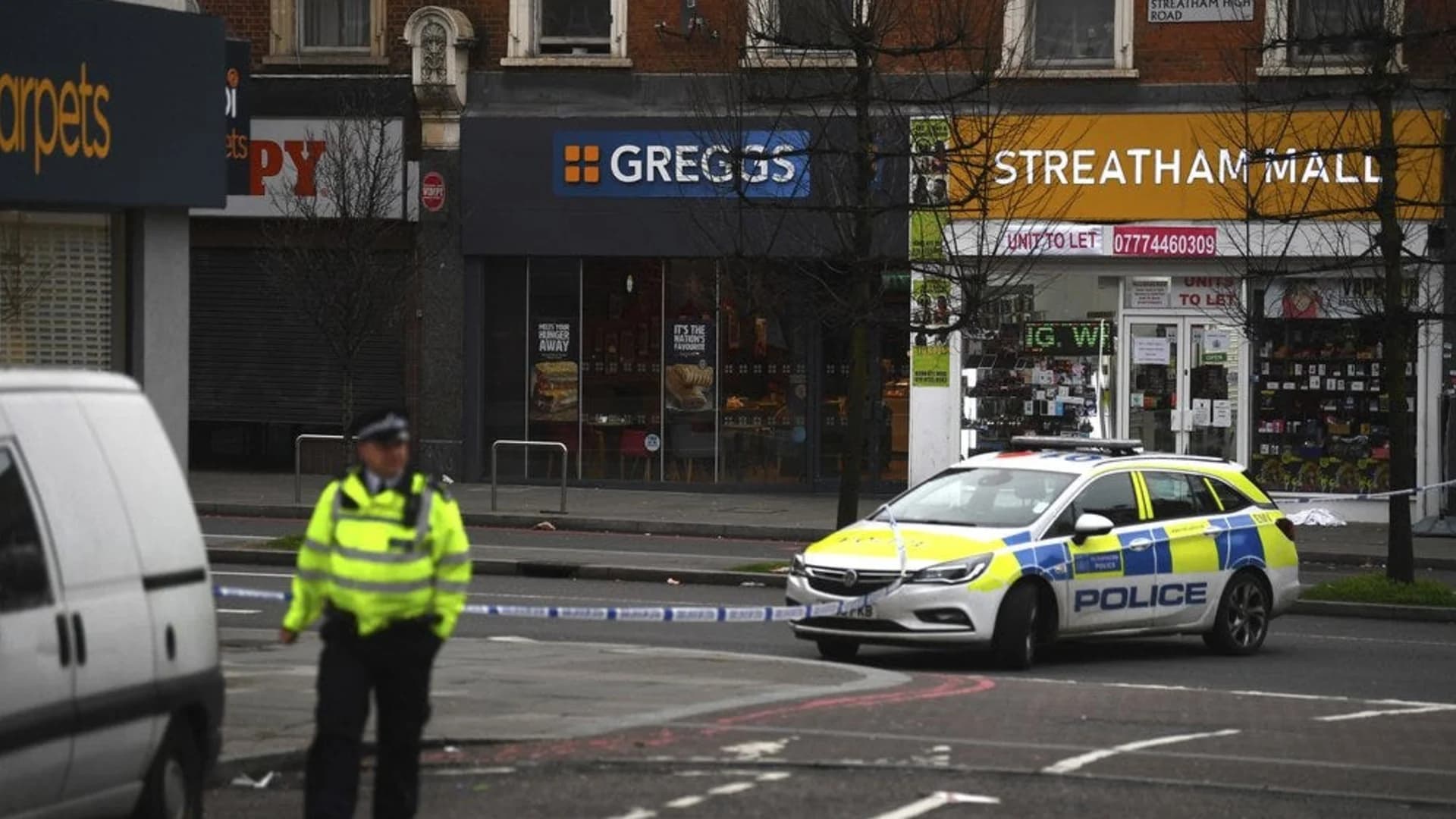 Man wearing fake bomb stabs 2 in London and is shot to death