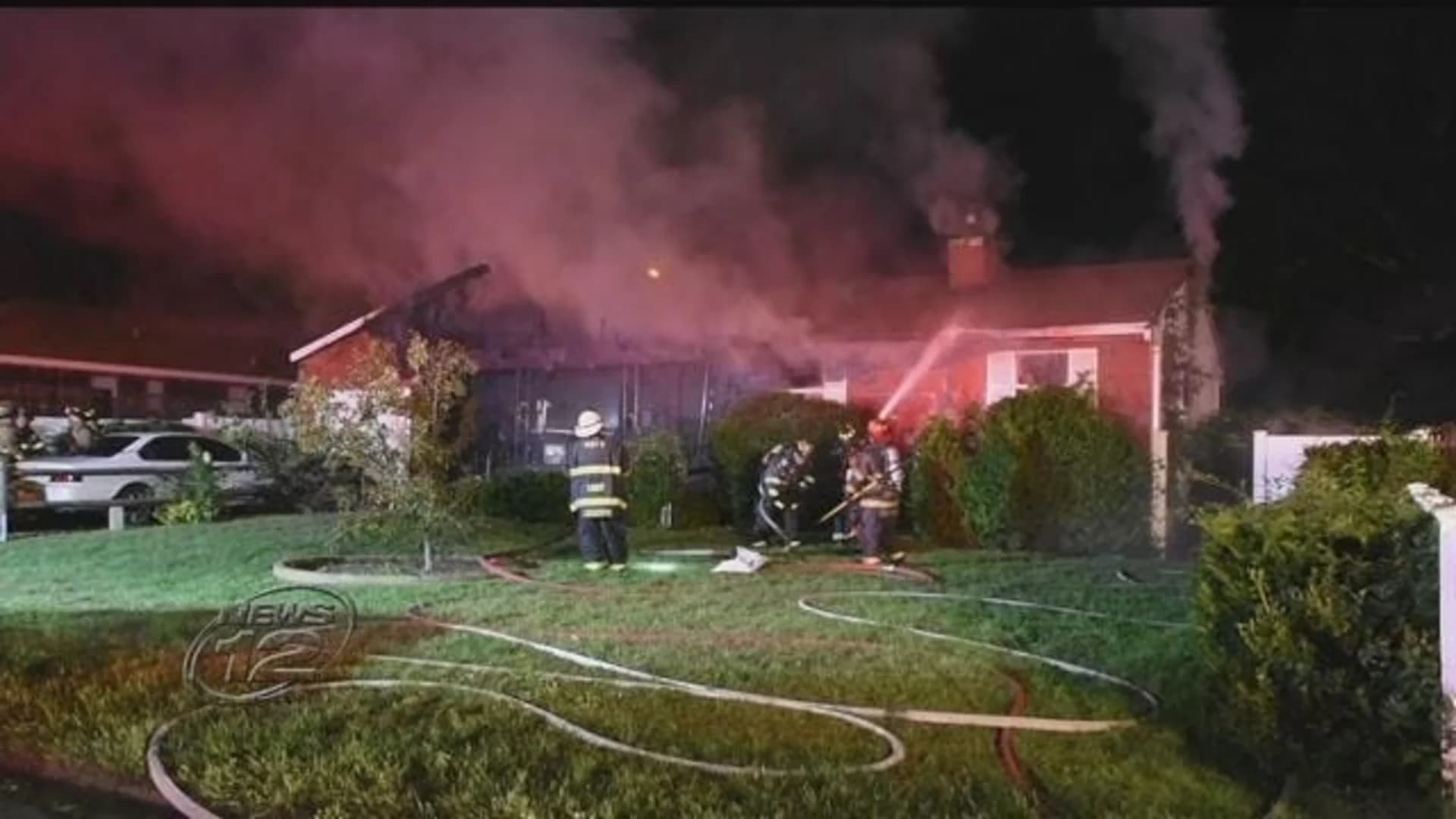 Fire rips through home in Shirley
