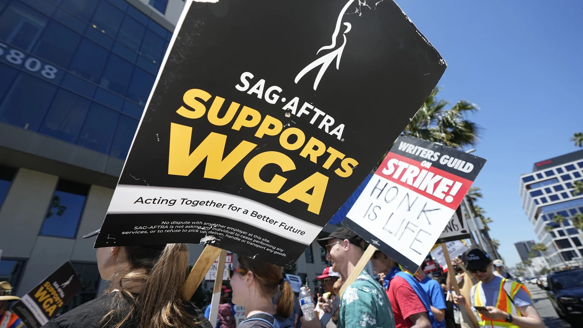 Hollywood actors join screenwriters in historic industry-stopping strike as contract talks collapse
