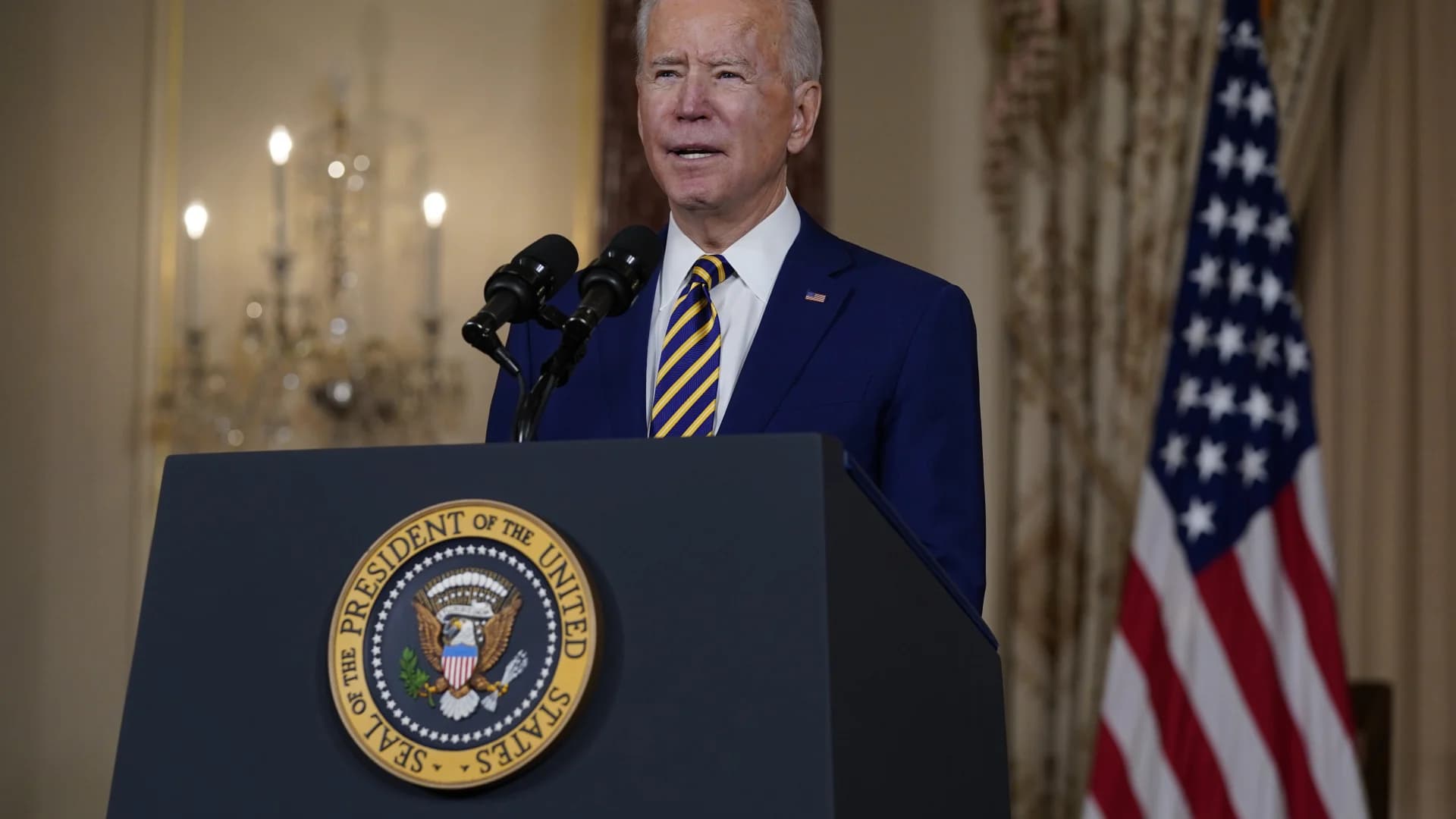 Biden strikes tough tone on Russia in diplomatic push